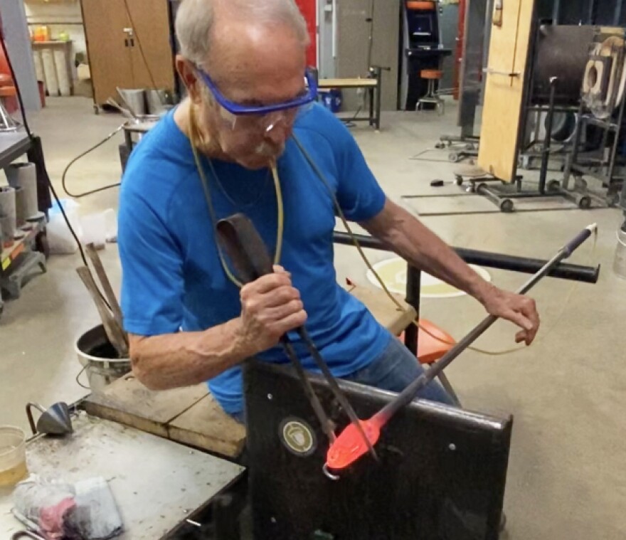 Larry Nisson blowing glass