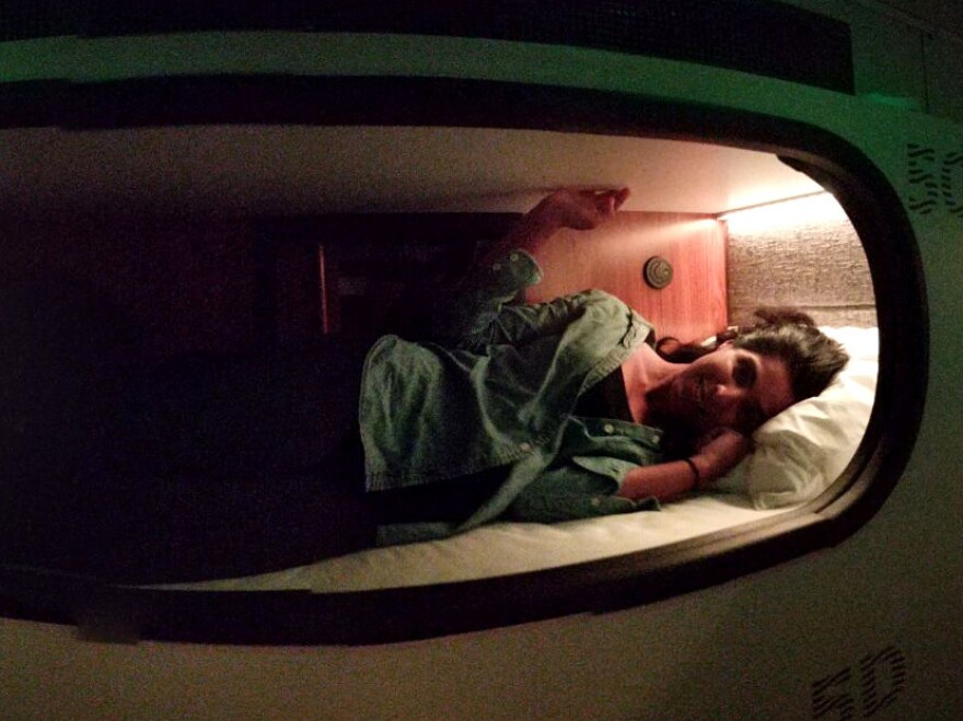 NPR's Aarti Shahani tries one of the sleeping pods aboard a Cabin bus traveling from Santa Monica, Calif., to San Francisco.