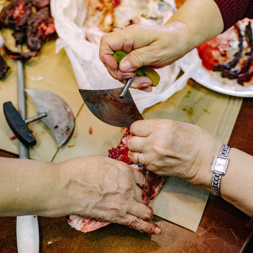 Traditionally, the women and children in the community eat with an ulu knife.