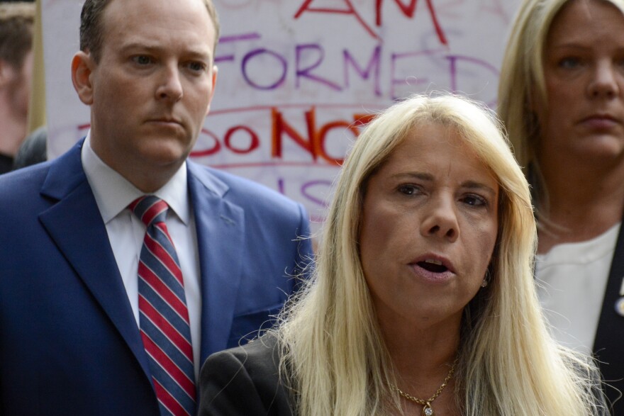 Lisa Townsend, physician's assistant at Long Island State Veterans Home, said she is more afraid of the vaccine than she is of coronavirus. N.Y. Gov. hopeful Lee Zeldin looks on.