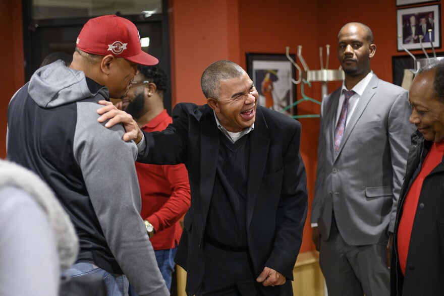 Democratic U.S. Rep. Lacy Clay laughs with supporters Tuesday night at a Pasta House restaurant in University City. Clay easily defeated his 1st District Republican challenger Robert Vroman.