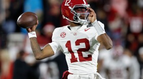 FILE - Alabama quarterback Keelon Russell (12) warms up before the first round of an NCAA College Football Playoff against Oklahoma, Friday, Dec. 19, 2025, in Norman, Okla. (AP Photo/Alonzo Adams, File)