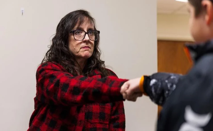Maryville Public Library Youth Services Coordinator Elizabeth Argo fist bumps a child after asking what his ideas are at the Children's Business Fair meeting Jan. 22. All participants are judged, and some will have the opportunity to compete for $100.