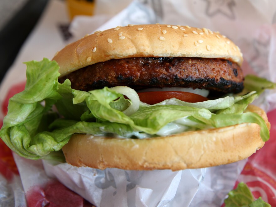 A Beyond Meat burger is displayed at a Carl's Jr. restaurant in San Francisco. The rise of meat alternatives made from plants, as well as meat grown from animal cells in labs, has sparked new laws on food labeling.