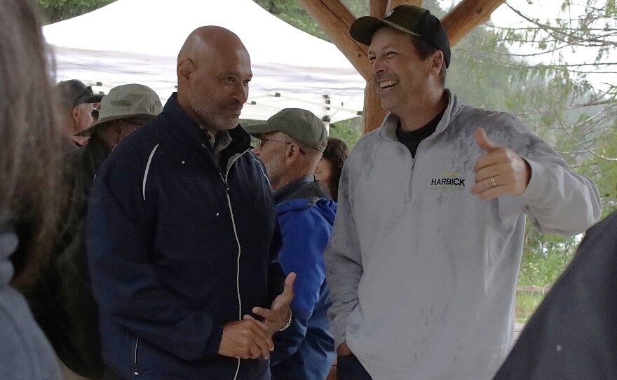 EWEB General Manager John Hairston (left) and Oregon State Rep. Darin Harbick (right) at the ribbon-cutting event on May 29, 2026.