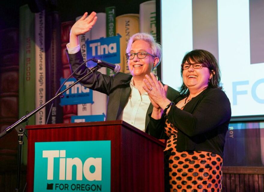 Tina Kotek and her wife, Aimee Wilson, speak to supporters at a Democratic primary victory party on May 17.