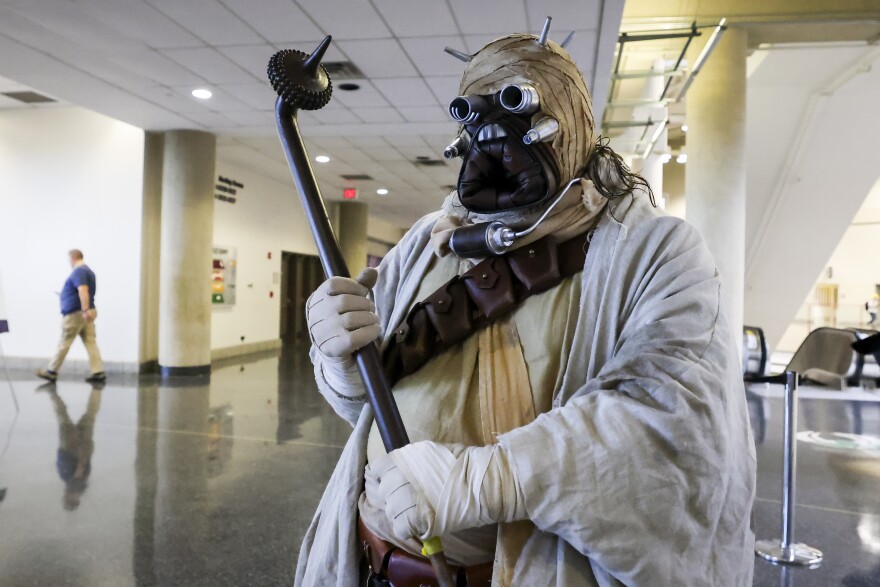 Taylor Lymbery dressed as a Tusken Raider enters FanExpo on Friday, May 30, 2025, at the Kay Bailey Hutchison Convention Center.