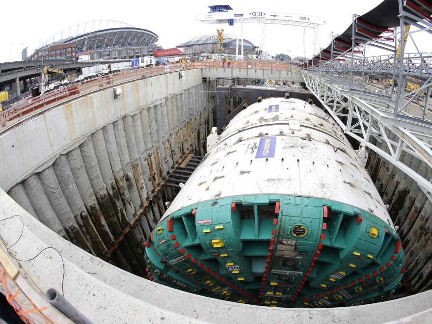 In this photo made with a fish-eye wide-angle lens, Bertha, the massive boring machine that is drilling a two-mile tunnel under Seattle, is shown in July before work began. The tunnel will replace a double deck highway along the downtown Seattle waterfront.