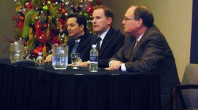 University of Missouri system Interim President Steve Owens (L), incoming president Timothy Wolfe and curator Warren Erdman (R) take questions following Wolfe's introduction as the system's next leader Tuesday morning, Dec. 13, 2011.