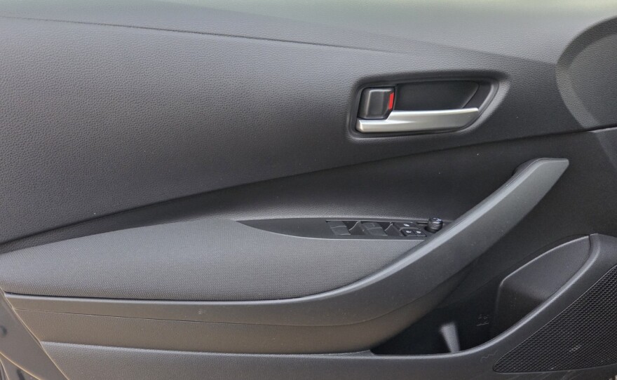 2026 Toyota Corolla SE AWD Hybrid door panel