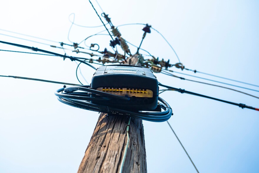 Rural Broadband fiberoptic access being installed by Central Electric Cooperatives around Stillwater Oklahoma. Fiber cable is being installed using existing Highline wires.