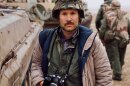 <em>National Geographic</em> photographer Steve McCurry, shown in Kuwait in 1991, says his big break came at a refugee camp near Peshawar, Pakistan, after he heard the sound of children laughing.