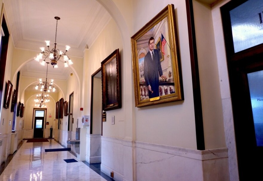Former House Speaker George Roberts’ portrait usually hangs in the Legislative Office Building, the lobby of which is dedicated to him. While that building is under construction, Roberts’ likeness is on display inside the statehouse.