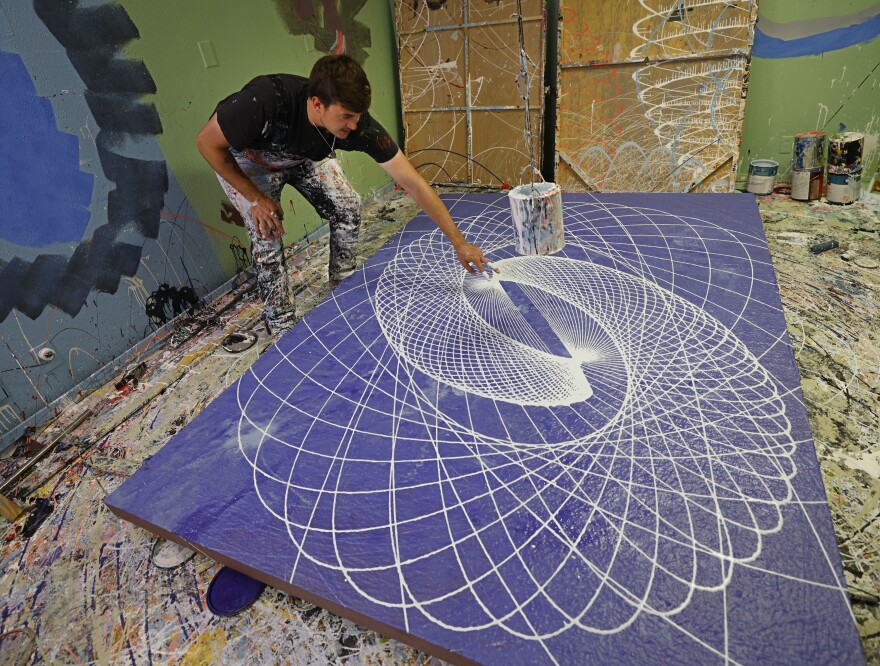 Action painter Cole Newman.