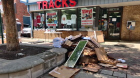 Clean-up from Friday's flooding continues on Kirkwood Ave. Saturday afternoon.