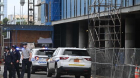 Rescue workers outside an apartment building