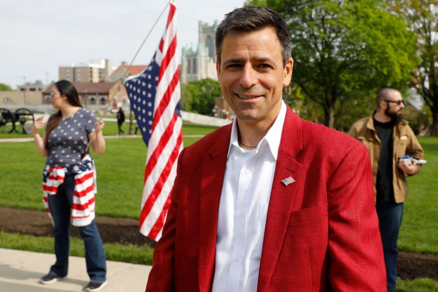 Ryan Kelly, a Republican candidate for governor, attends a rally in support of First Amendment rights and to protest against Gov. Gretchen Whitmer, outside the Michigan State Capitol in Lansing, Mich., on May 15, 2021.