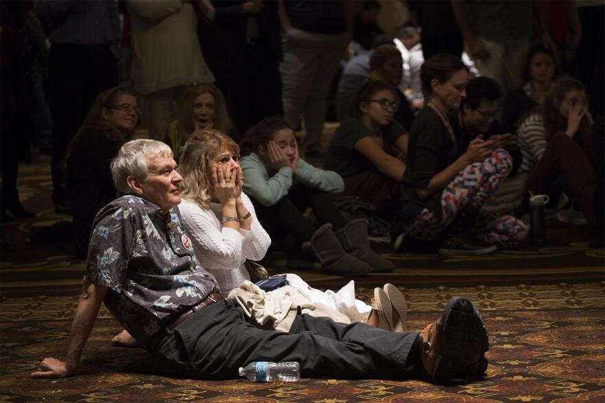 Tom and Tayebeh Hardy watch presidential election results come in at the Koster campaign's election night watch party at the Chase Park Plaza.