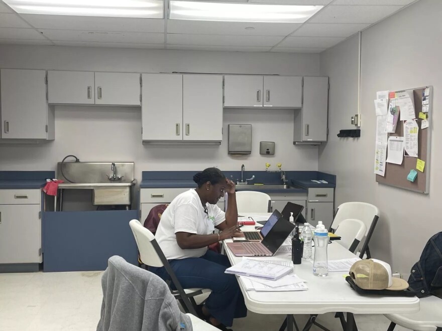 When the Indianapolis Clinician-Led Community Response Team started in 2023 it only reached people in IMPD’s downtown district. This year it expanded to the east side, and in 2025 the program will serve residents on the north side. The picture shows program manager Teena Turner working in the CLCR Team office in the basement of the City-County Building in 2023.