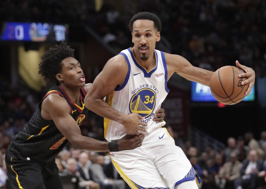 Golden State Warriors guard Shaun Livingston (34) drives past the Cleveland Cavaliers' Collin Sexton (2) during a 2018 NBA game in Cleveland. (AP Photo/Tony Dejak)