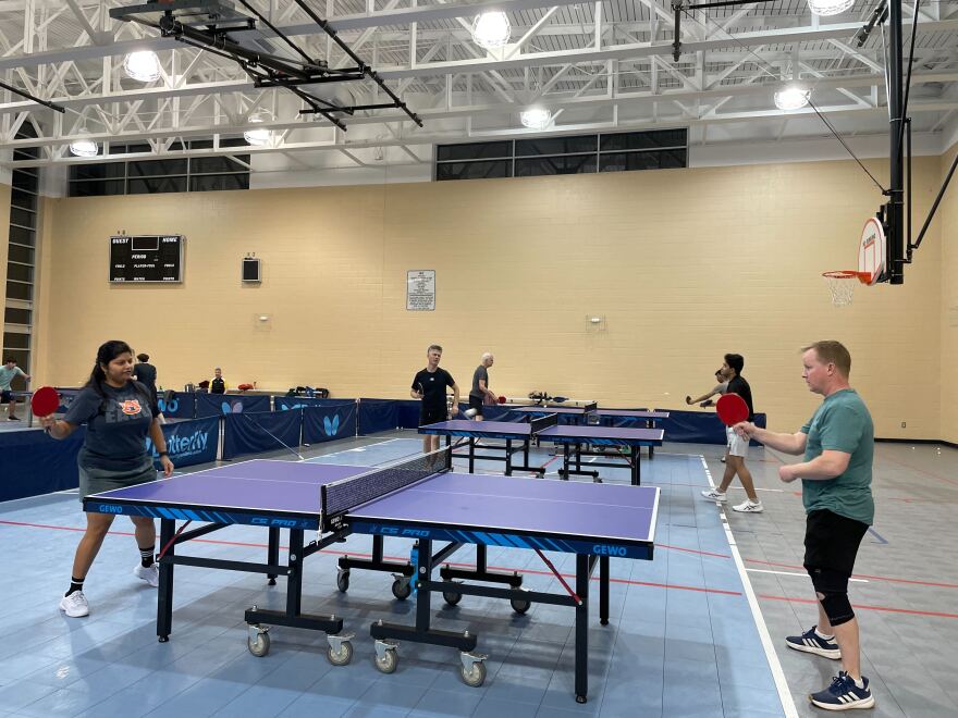 Anjali Singh, left, plays Mike Wilhelm on Dec. 1, 2025, at the St. Andrews Park gym in Columbia, S.C.