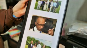 Sharon Gwinn holds a picture of her husband, who had Lewy body dementia toward the end of his life. Reckless financial behavior was one of the first signs of the disease. "It's what attacked his brain first," Gwinn says.
