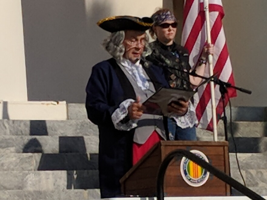 Joe West portrays Benjamin Franklin reading the full text of the Declaration of Independence.