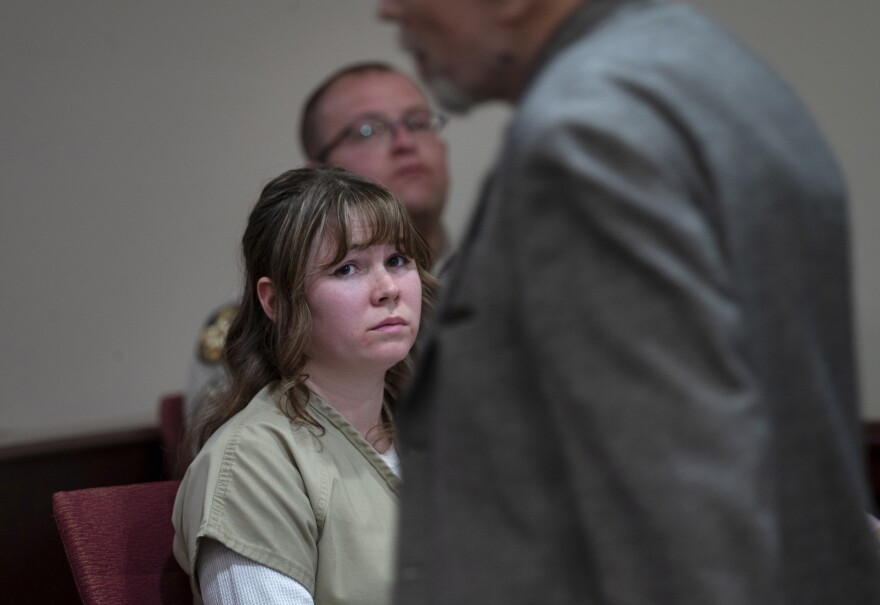 Hannah Gutierrez-Reed watches her father Thell Reed leave the podium after he asked the judge not impose prison time on his daughter, during a sentencing hearing in Santa Fe, New Mexico, on Monday April 15, 2024. Gutierrez-Reed, armorer on the set of the Western film "Rust," was convicted in March of involuntary manslaughter in the death of cinematographer Halyna Hutchins, who was fatally shot by Alec Baldwin in 2021. Gutierrez Reed was sentenced to 18 months in prison. (Eddie Moore/The Albuquerque Journal via AP, Pool)