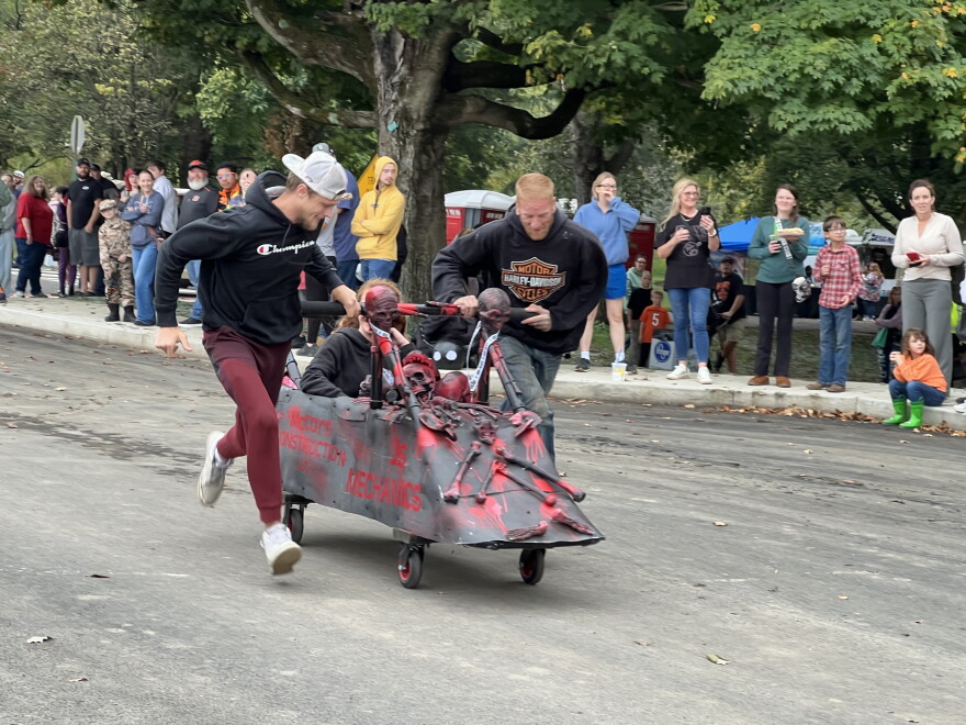 A team sprints down the track at the annual Chillicothe Coffin Races.