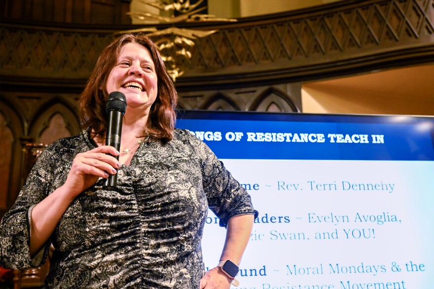 Rev. Terri Dennehy of the Unitarian Universalist Congregation in Stamford teaches protest songs to an audience at the church on February 11, 2026.