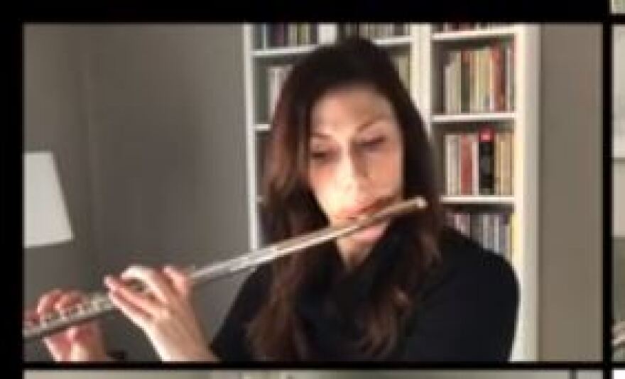 photo of Erin Helgeson Torres playing flute