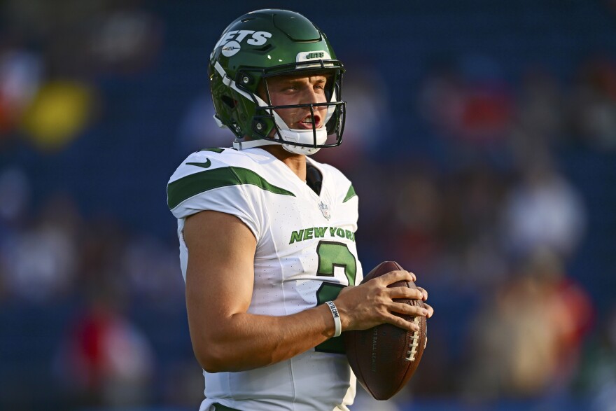 New York Jets quarterback Zach Wilson warms up for the team's Hall of Fame NFL football preseason game against the Cleveland Browns, Thursday, Aug. 3, 2023, in Canton, Ohio. (AP Photo/David Dermer)