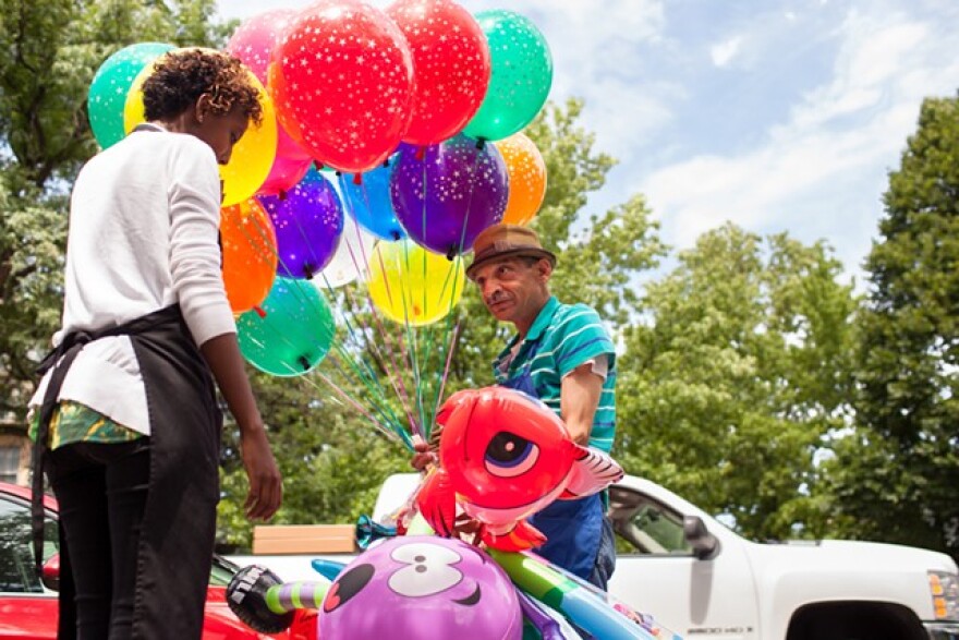 A balloon vendor at the 2013 Rochester Pride Festival.