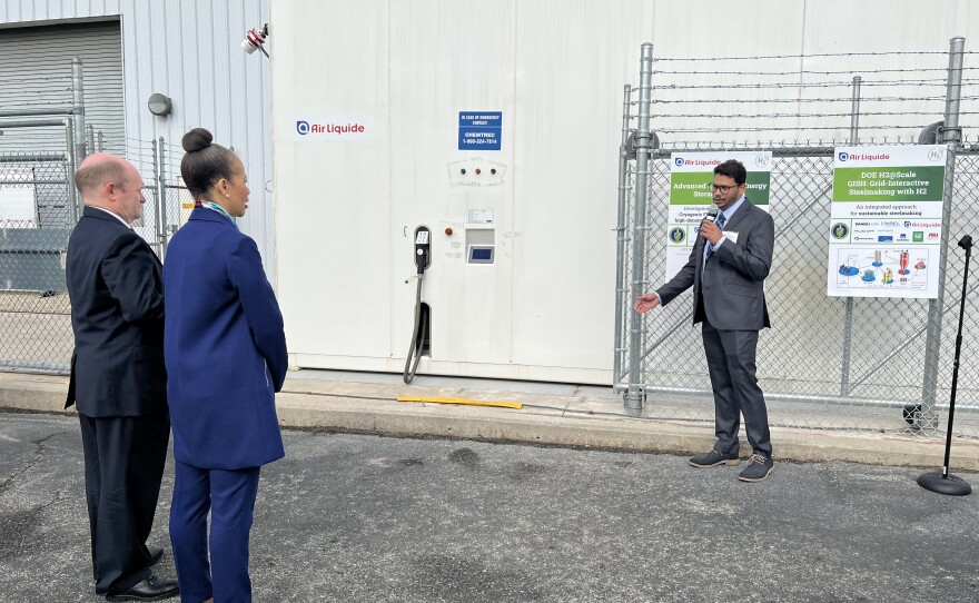 Sen. Coons and Rep. Blunt Rochester listen as Bikram Roy Chowdhury, Senior Research Scientist for Process Engineering and Combustion, explains the hydrogen fuel-cell technology, and how hydrogen hubs will be used to refuel cars.