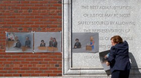 The U.S. Supreme Court will review a lower court's decision from last summer that vacated the six death sentences imposed on Boston Marathon bomber Dzhokhar Tsarnaev. Here, artist Jane Flavell Collins pulls down her courtroom sketches outside the Moakley U.S. Courthouse in Boston after Tsarnaev was sentenced.