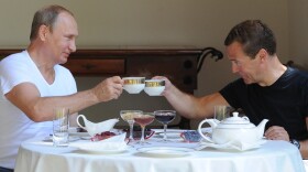 Putin and Medvedev clinked teacups during their post-workout meal.