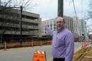 David B. Smith of Charlotte Department of Transportation points out a Verizon Wireless 5G tower in Southpark. He oversees permits for communications companies that want to use city rights-of-way. 