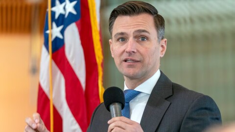 FILE - Oregon Attorney General Dan Rayfield speaks during a town hall held at the Federal Building in Portland, Ore., March 17, 2025. Rayfield is among the attorneys general who sued the Trump administration over its new work requirements for people who get their health insurance through Medicaid.