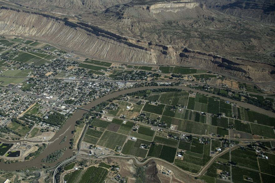 Overhead view of the Colorado River carving through the landscape.