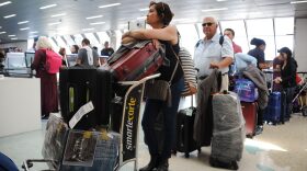People crowd Fort Lauderdale International Airport as evacuation is underway for the arrival of Hurricane Irma, Sept. 7, 2017 in Fort Lauderdale, Fla. (Michele Eve Sandberg/AFP/Getty Images)