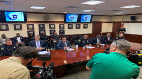 Mayor John Cranley, CPD Chief Elliot Isaac and other public officials gather to address reducing violent crimes in Cincinnati.