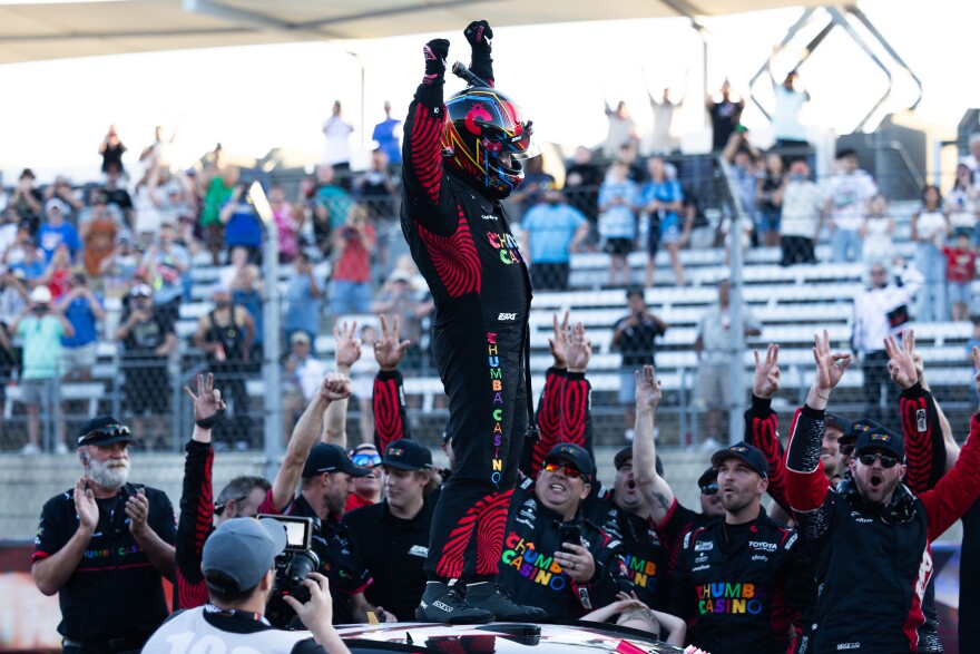 Tyler Reddick celebrates after winning the NASCAR Cup Series DuraMax Grand Prix.