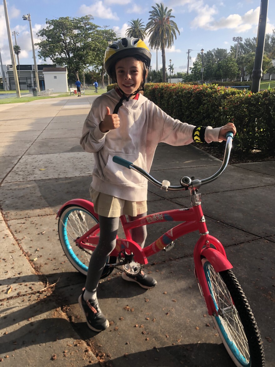 Eight year old Zuri Deppen says she loves how her bike lights up at night. She says biking to school is more fun than riding in a car. But for many South Florida students, biking isn't a safe option.