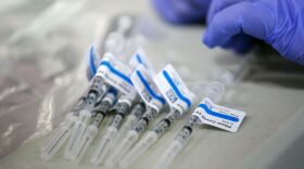 OPB file photo of vaccine doses being prepared.