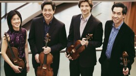 Ying Quartet, l-r: Janet Ying (violin), Phillip Ying (viola) new first violinist Robin Scott, and David Ying (cello), in Wolk Atrium outside Hatch Hall at Eastman Theatre, Eastman School of Music March 23, 2015 // photo by J. Adam Fenster / University of Rochester