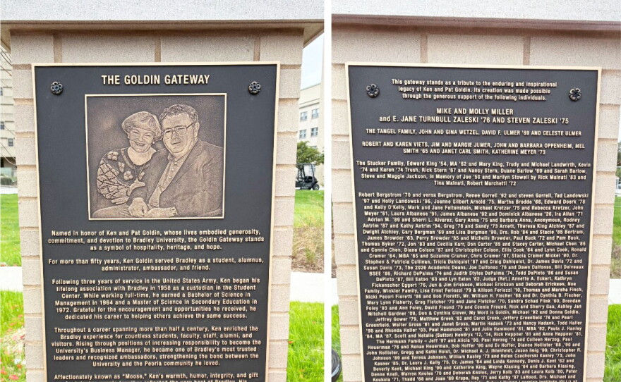 Two bronze plaques mounted on a stone monument: one featuring a portrait of Ken and Pat Goldin with a biographical tribute, and the other listing donors and the dedication date of October 16, 2026.