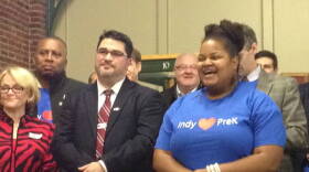 Ashley Thomas, right, looks on as Mayor Greg Ballard speaks before a vote of the City-County Council on PreK funding