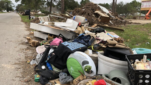 Debris collects on a street in Navarre.