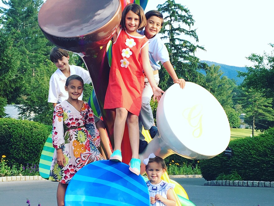 Elizabeth Webb and Louise Cruea both experienced two flood evacuations with their respective children, pictured here.
