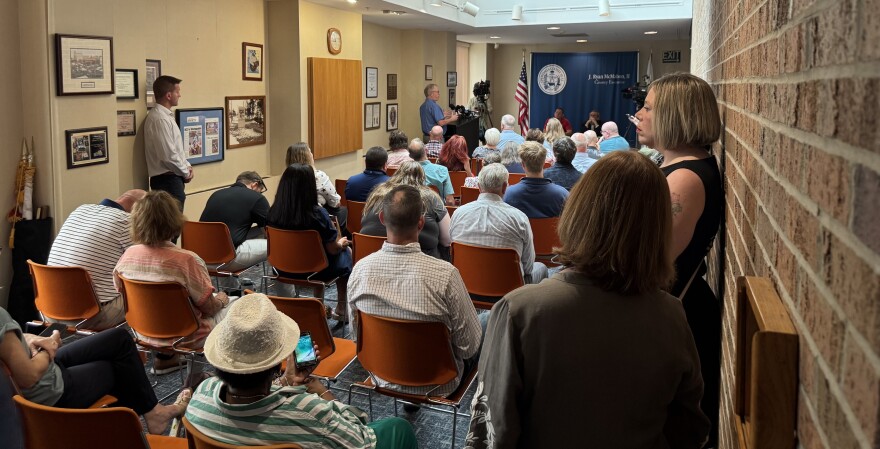 People filled the room for the 9:00 a.m. hearing.